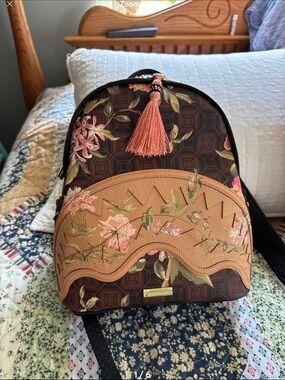 Sprayground Floral Embroidered Brown and Tan Mini Backpack. Sold out online